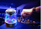 Portable Bluetooth speakers offer a column design, wireless connectivity, powerful bass, radio functionality, and variable color LED lighting.