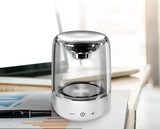 Portable Bluetooth speakers offer a column design, wireless connectivity, powerful bass, radio functionality, and variable color LED lighting.